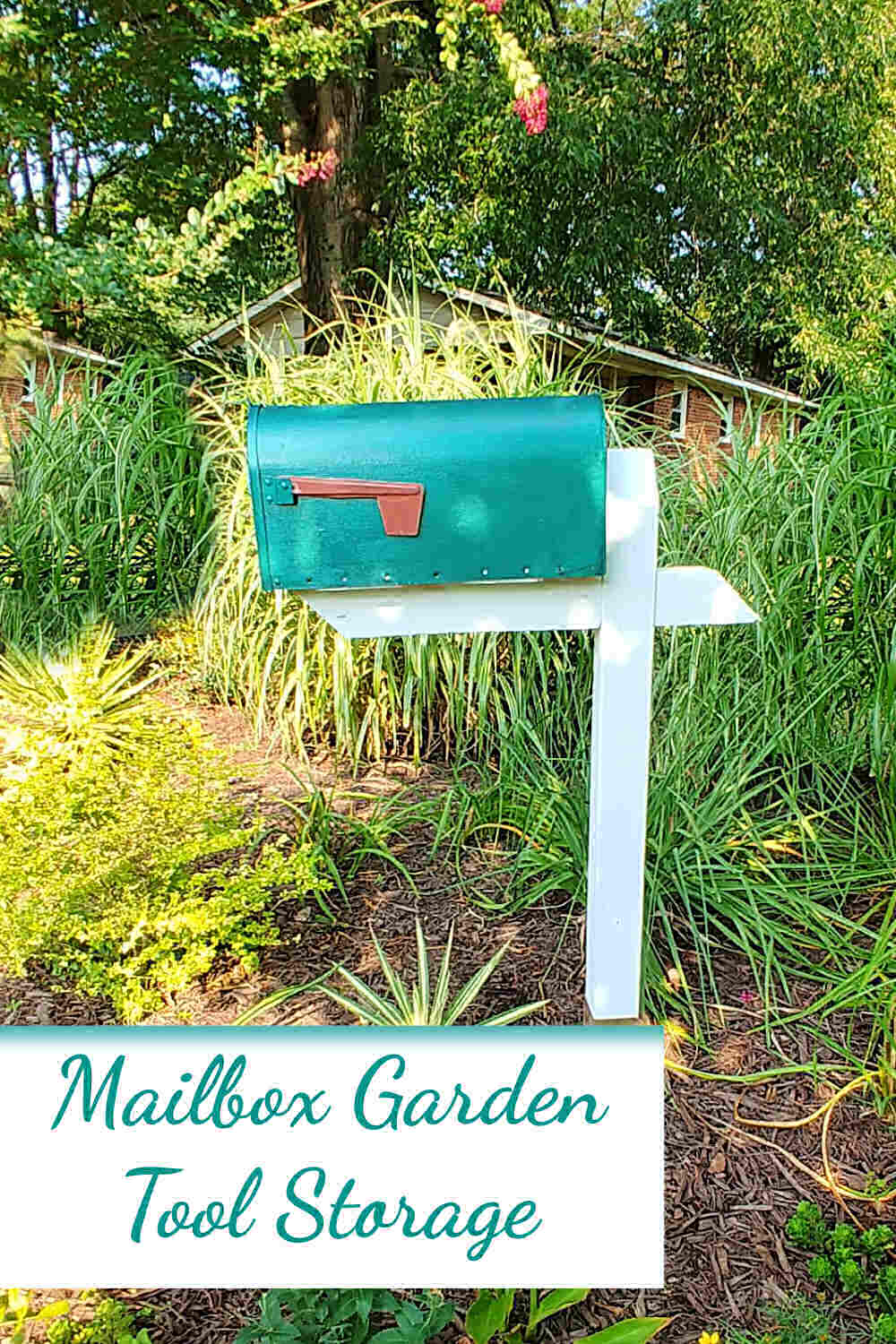 Green mailbox on a white post in a garden with words mailbox garden tool storage.